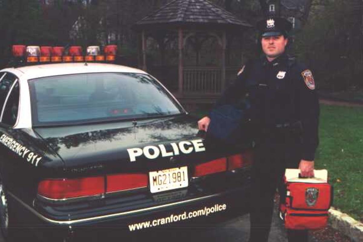 Police Car and Policeman